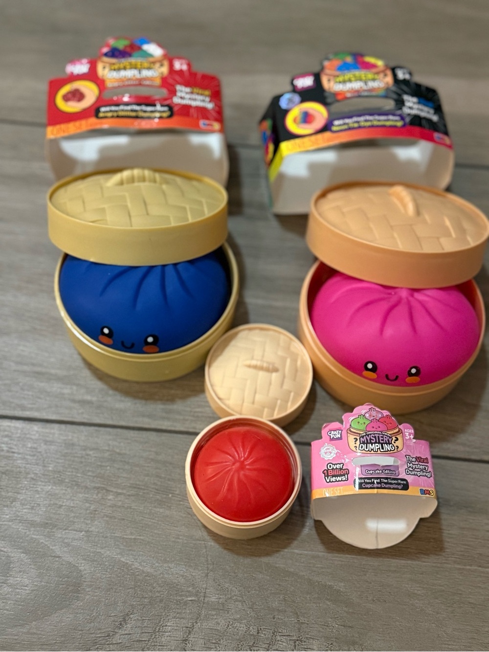 Pink, blue, and red RMS Mystery Dumpling Kids Toy Surprise Pack